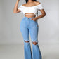 Knee Rip Flare Jean in Medium Wash - Leur Beau Monde Boutique